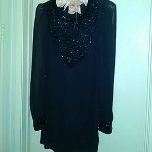 Dress with embroidered details